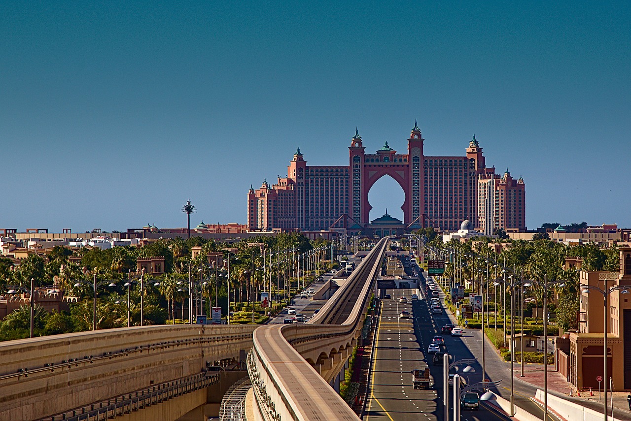 Dubai like a local: Atlantis Hotel on Palm Jumeirah with its iconic arch design and beachside setting at sunset