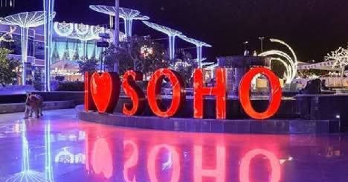The vibrant neon-lit promenade of SOHO Square in Sharm El Sheikh, Travel Easy World